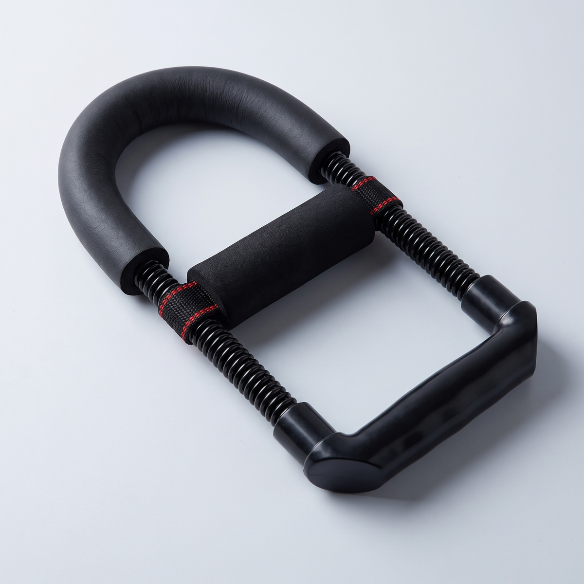 Close-up of Elvayro adjustable wrist and forearm strengthener with padded handles and springs